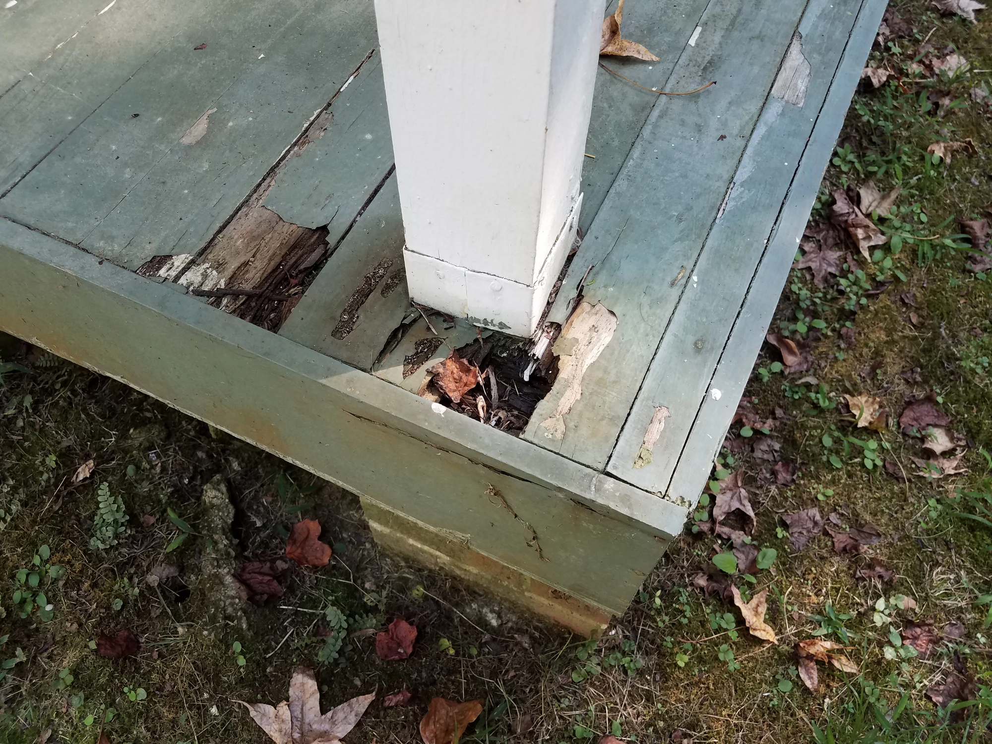 a deck building contractor in camden de has their work cut out for them with this rotting Delaware deck